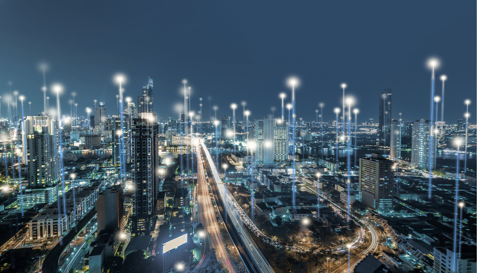 Engineering infrastructure and energy facilities in Canada at night representing industrial growth and talent demand