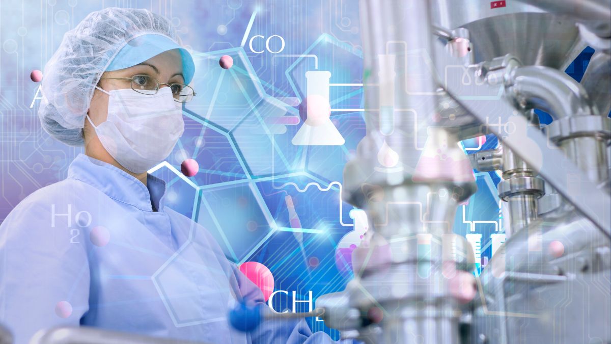 Lab technician in a GMP biomanufacturing facility analyzing equipment and data, representing Canada’s growing biomanufacturing workforce needs.