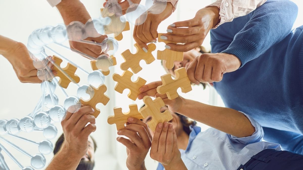 Hands joining together to symbolize collaboration and talent supporting Canada’s biomanufacturing growth and life sciences hiring