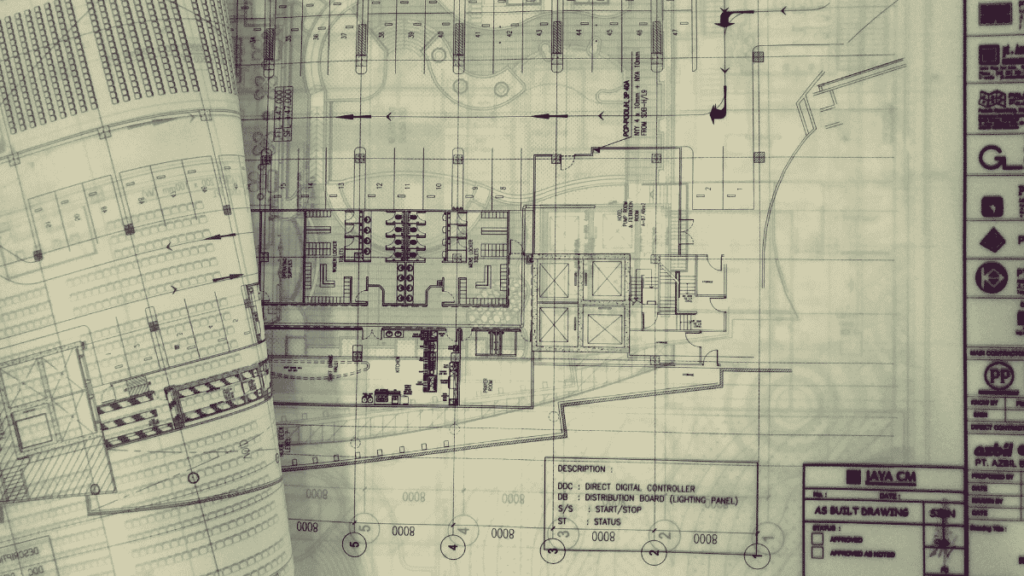 Engineering blueprints representing career opportunities at Hatch